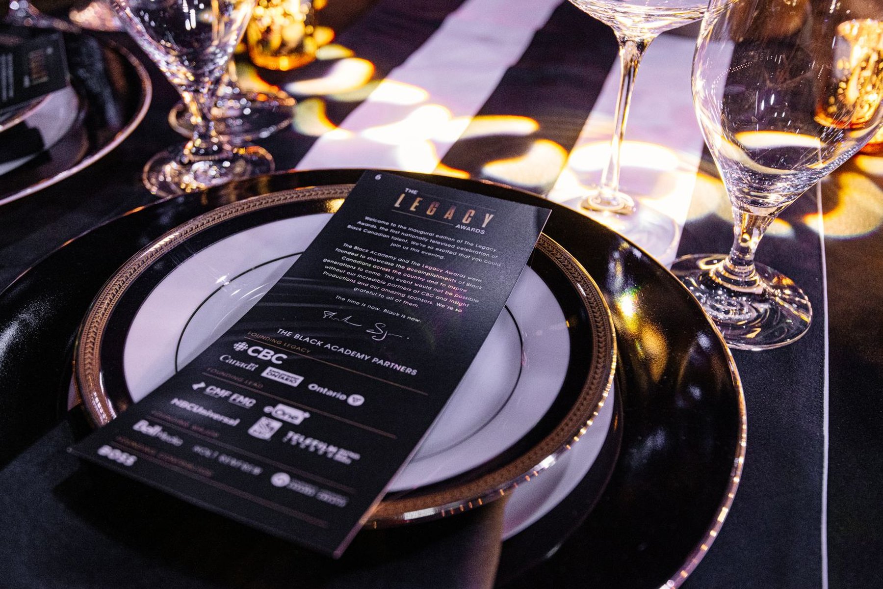 Legacy Awards place setting and partner card